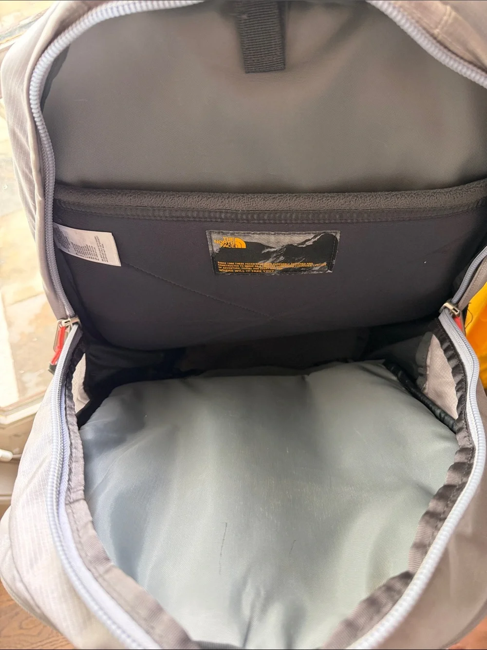 The North Face Gray Backpack with Neon Pink Accents